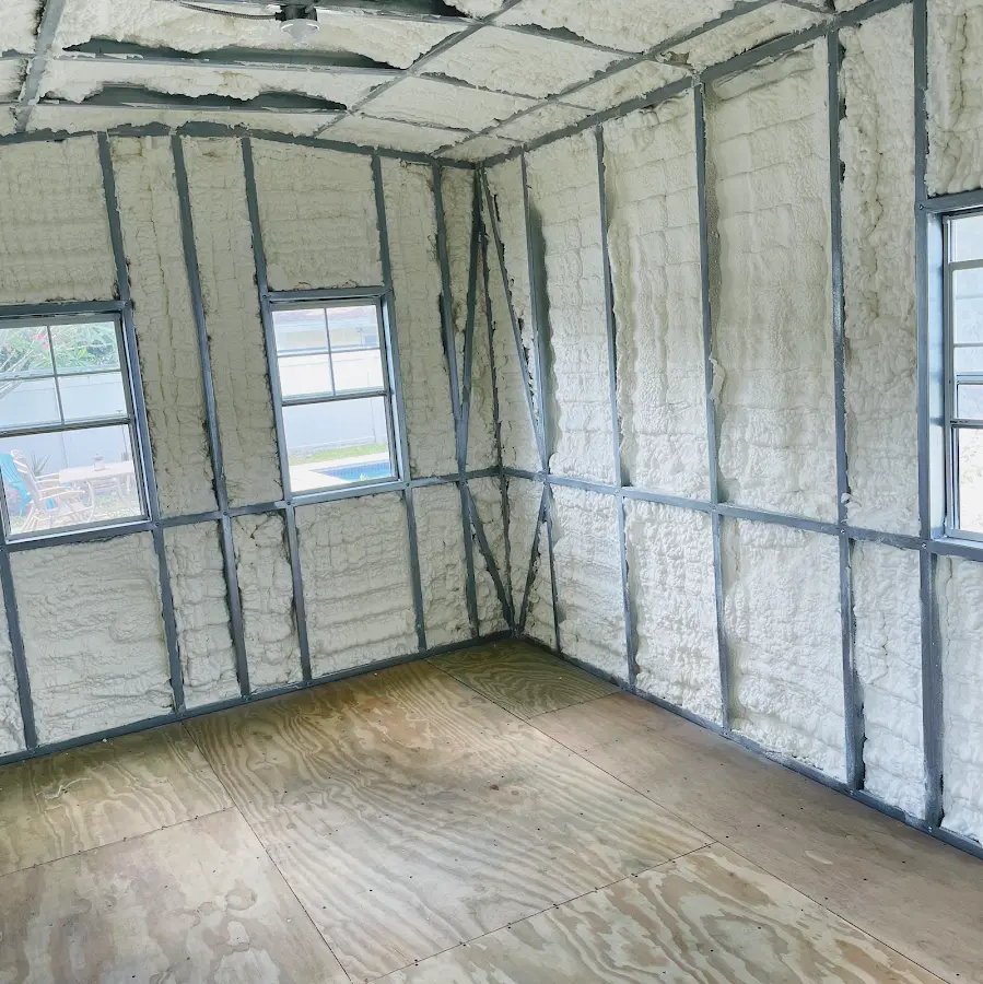 Closed-cell spray foam insulation applied to wall cavities in a residential project in Harriman