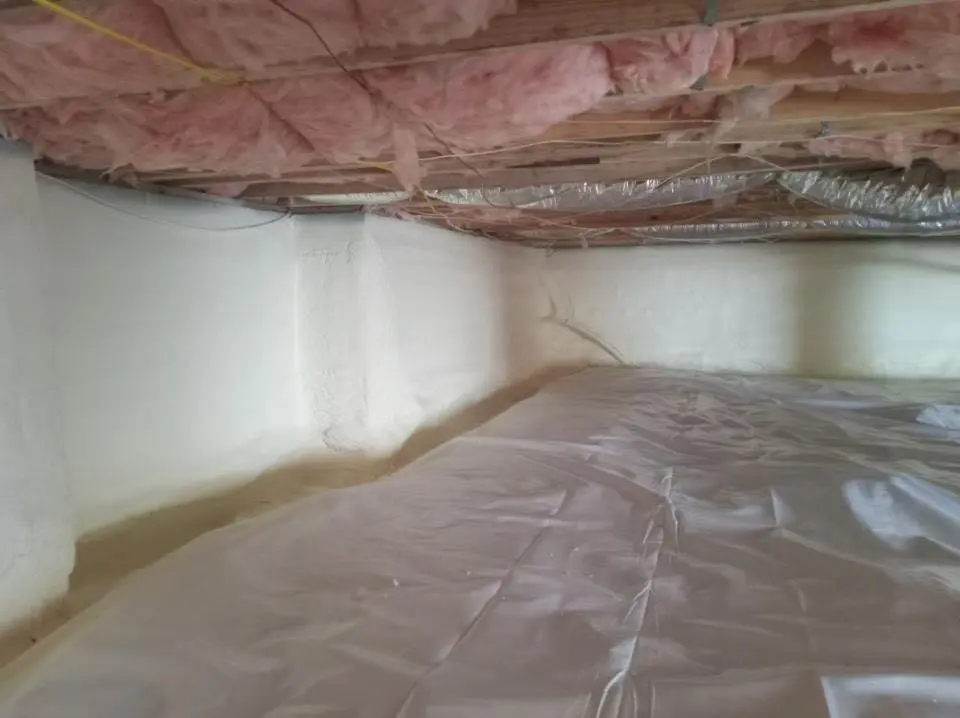 Crawl space encapsulation with closed-cell spray foam for Commercial Roof Restoration in Harriman